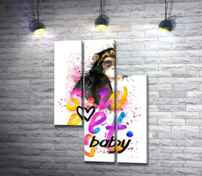 Модна мавпа сидить над написом "sweet baby"