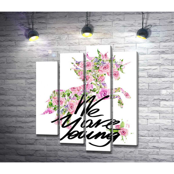 Цветочный силуэт единорога за надписью "we are young"