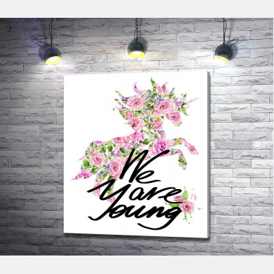 Квітковий силует єдинорога за написом "we are young"