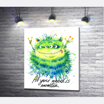 Зеленый четырехглазый монстр с надписью "all you need is monster"