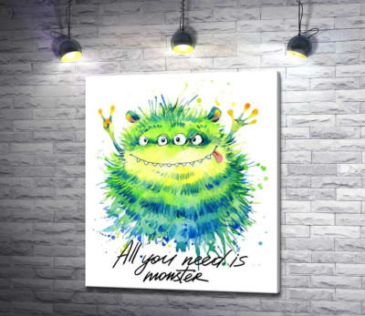 Зеленый четырехглазый монстр с надписью "all you need is monster"