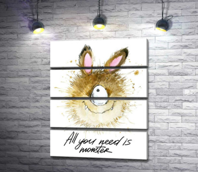 Пушистый циклоп с заячьими ушами и надписью "all you need is monster"