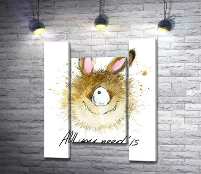 Пушистый циклоп с заячьими ушами и надписью "all you need is monster"