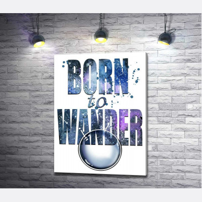Космічний напис "born to wander"