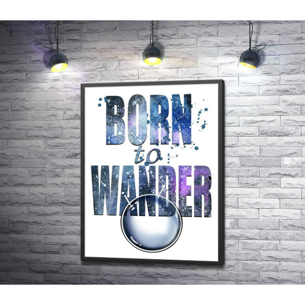 Космічний напис "born to wander"
