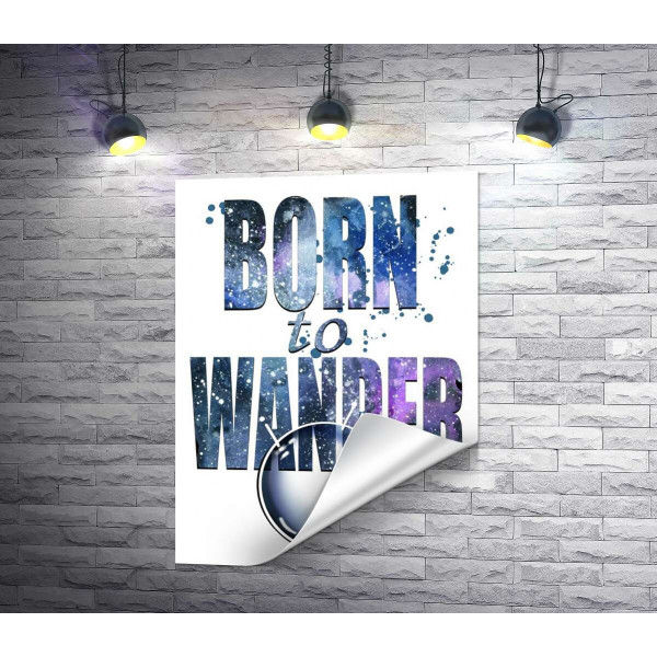 Космическая надпись "born to wander"