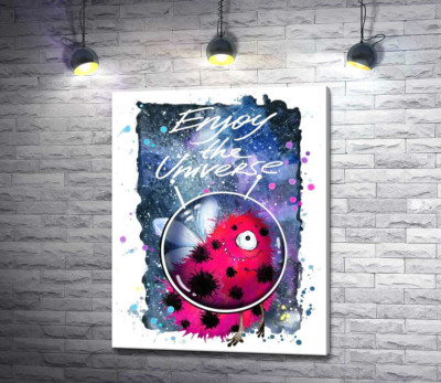 Червоний монстр з крильцями серед космосу з написом "Enjoy the Universe"