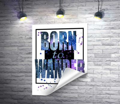 Космічний напис у синіх тонах "born to wander"