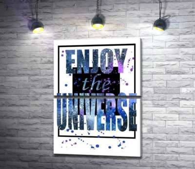 Космическая надпись в черной рамке "enjoy the universe"