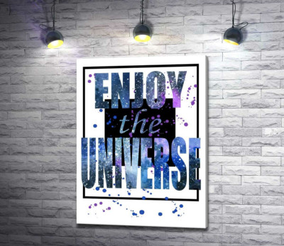 Космическая надпись в черной рамке "enjoy the universe"