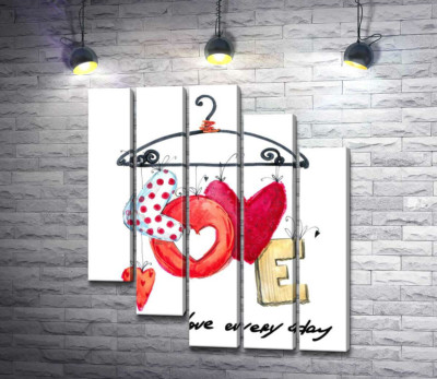 Модульна картина "Кольорові літери "love" висять на вішалці"