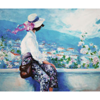 Девушка смотрит на живописные склоны цветущего города