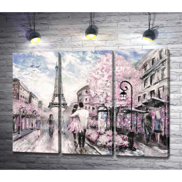 Закохана пара гуляє весняною вулицею Парижу