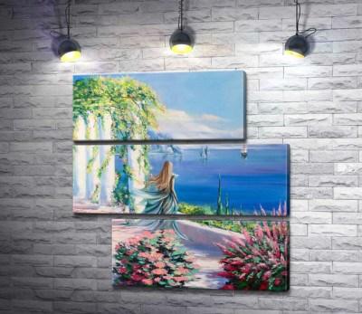 Силуэт девушки, которая смотрит на море из сада