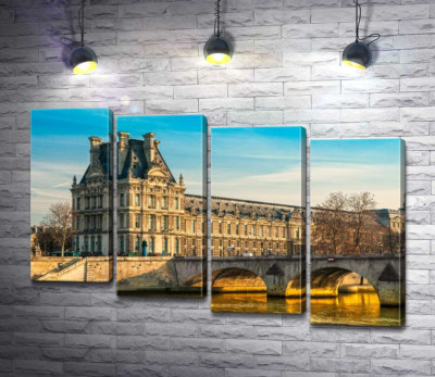 Будівля Лувру (Louvre) біля берегів Сени
