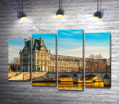 Будівля Лувру (Louvre) біля берегів Сени