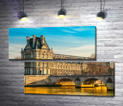 Будівля Лувру (Louvre) біля берегів Сени