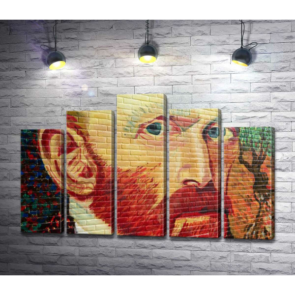Портрет Винсента Ван Гога сверкает красками на стене