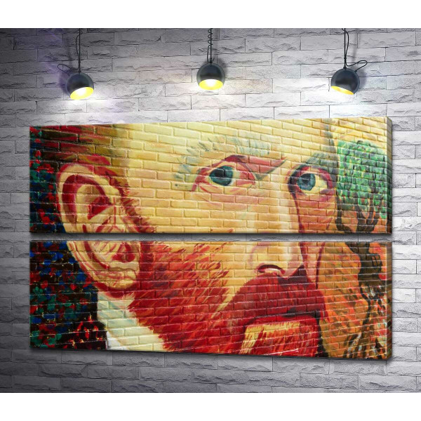 Портрет Винсента Ван Гога сверкает красками на стене