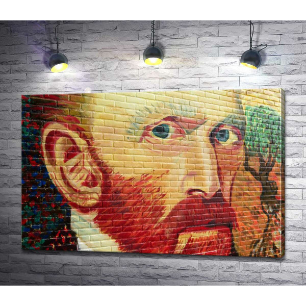 Портрет Вінсента Ван Гога виблискує фарбами на стіні
