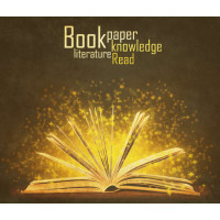 Золоті іскри знань літають між сторінками книги