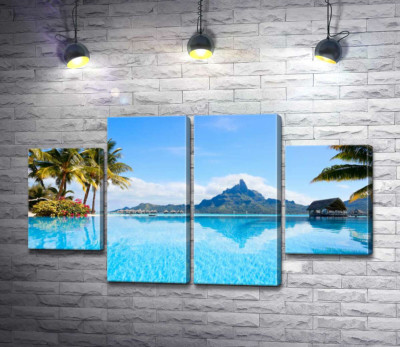 Горный хребет острова Бора-Бора (Bora Bora) отражается в бирюзе тропического океана