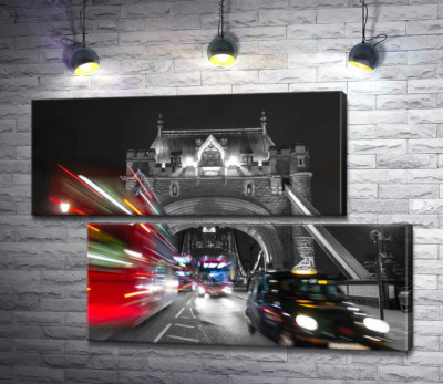 Автомобілі мчать по нічному Тауерському мосту (Tower Bridge)