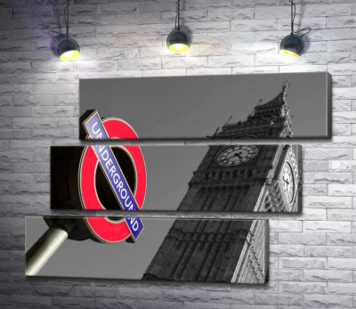 Значок входу у метро біля стрункої вежі Біг Бена (Big Ben)