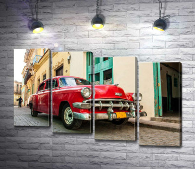 Червоний Chevrolet Bel Air на сонячній вулиці