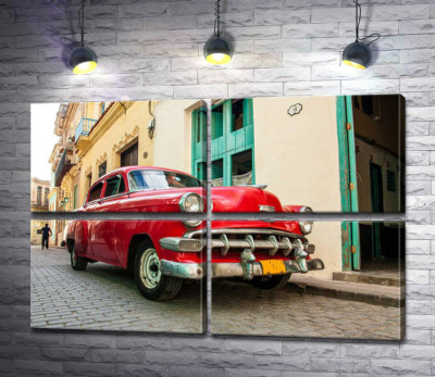 Червоний Chevrolet Bel Air на сонячній вулиці