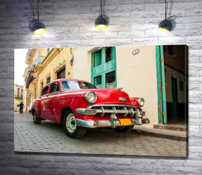 Красный Chevrolet Bel Air на солнечной улице