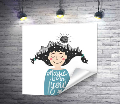 Высокие хребты гор в темных волосах девочки с фразой "magic is in you"