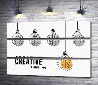 Гирлянда из лампочек над фразой "creative thinking"