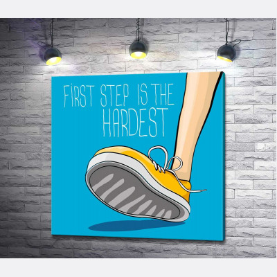 Жовтий кросівок ступає на землю поряд з фразою "first step is the hardest"