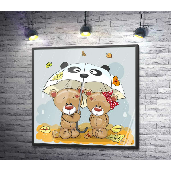 Два ведмедика рятуються від осіннього дощу під парасолькою