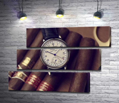 Элитные часы Vacheron-Constantin лежат на сигарах