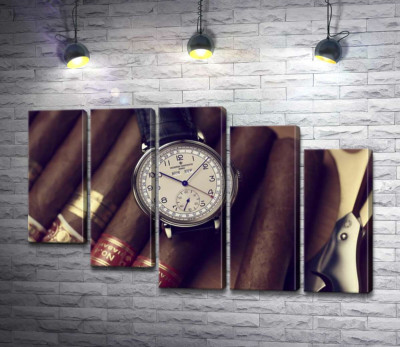 Элитные часы Vacheron-Constantin лежат на сигарах