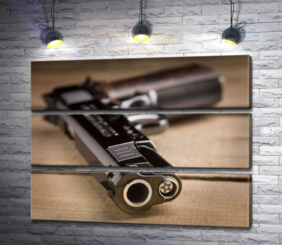 Модульная картина "Дуло черного пистолета M1911"