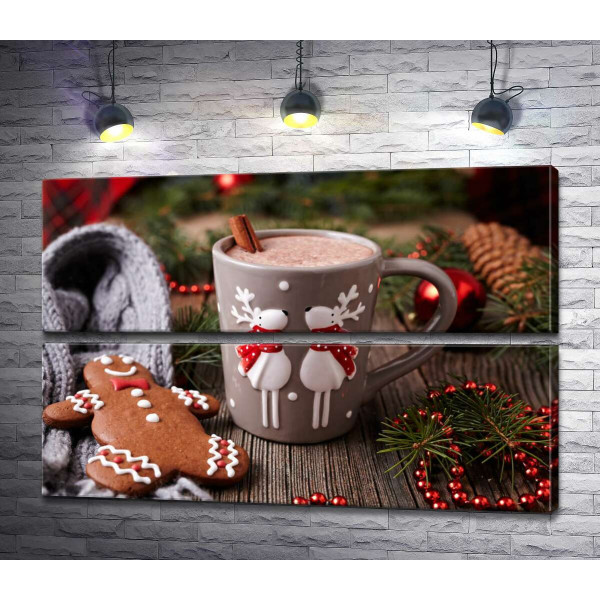 Веселые олени на чашке какао рядом с пряничным человечком