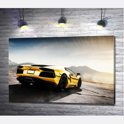 Чорні елементи жовтого автомобіля Lamborghini Aventador