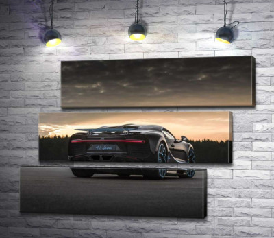 Темний силует чорного спортивного автомобіля Bugatti Chiron
