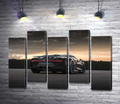 Темний силует чорного спортивного автомобіля Bugatti Chiron