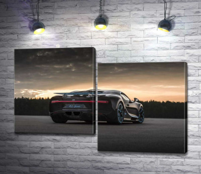 Темний силует чорного спортивного автомобіля Bugatti Chiron