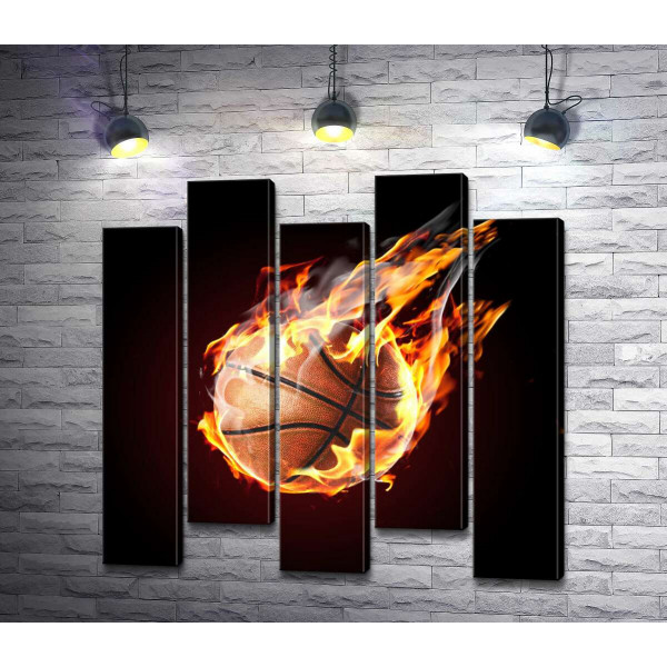 Баскетбольний м'яч у вогняному польоті