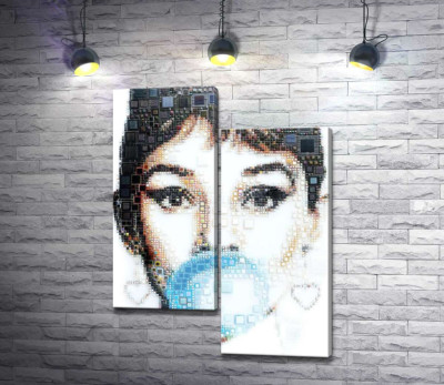 Актриса Одрі Гепберн (Audrey Hepburn) із жуйкою
