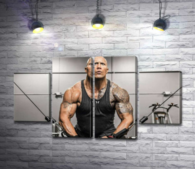 Двейн Джонсон (Dwayne Johnson) тренує м'язи рук в спортзалі