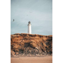 Вид маяк с морского пляжа