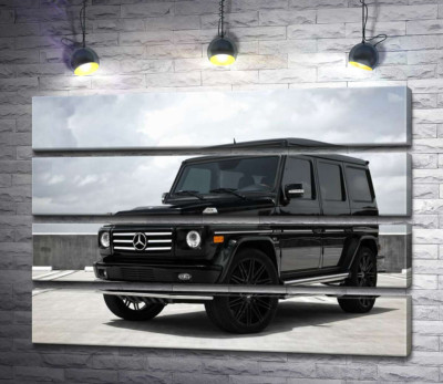 Чорний Mercedes Gelenvagen G55 AMG на бетонній дорозі