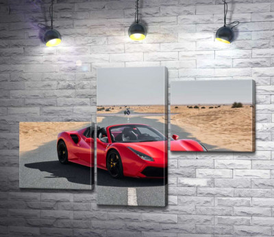 Красный автомобиль Ferrari 488 Spider на пустынной дороге