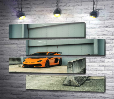Модульна картина "Помаранчевий автомобіль Lamborghini Aventador біля ангара"